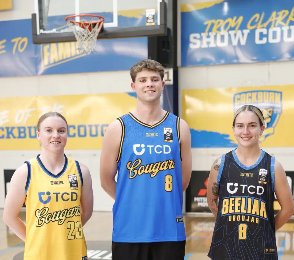 Three Cockburn Cougars juniors in TCD sponsored jerseys at the Cougars home court