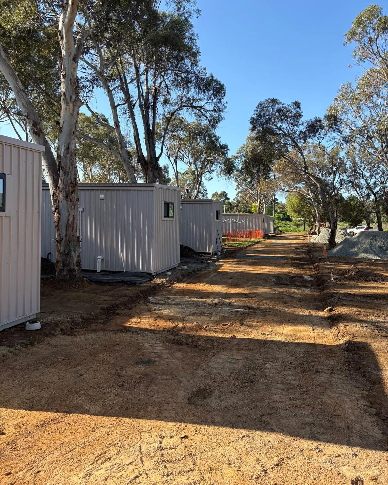 Studio units made by TCD, placed and connected among the gum trees at Harvey Caravan Park