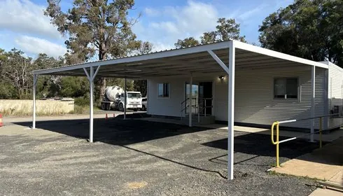 Two TCD buildings joined by a covered walkway at Holcim Busselton